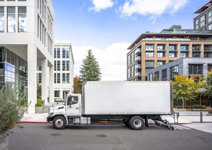 Moving truck in city