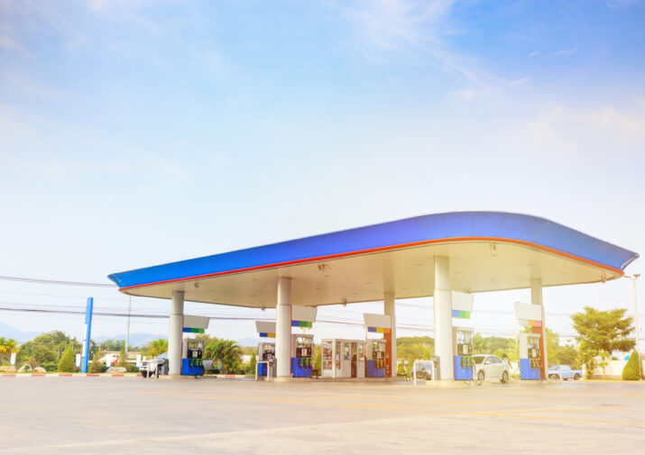 Petrol gas fuel station with clouds and blue sky